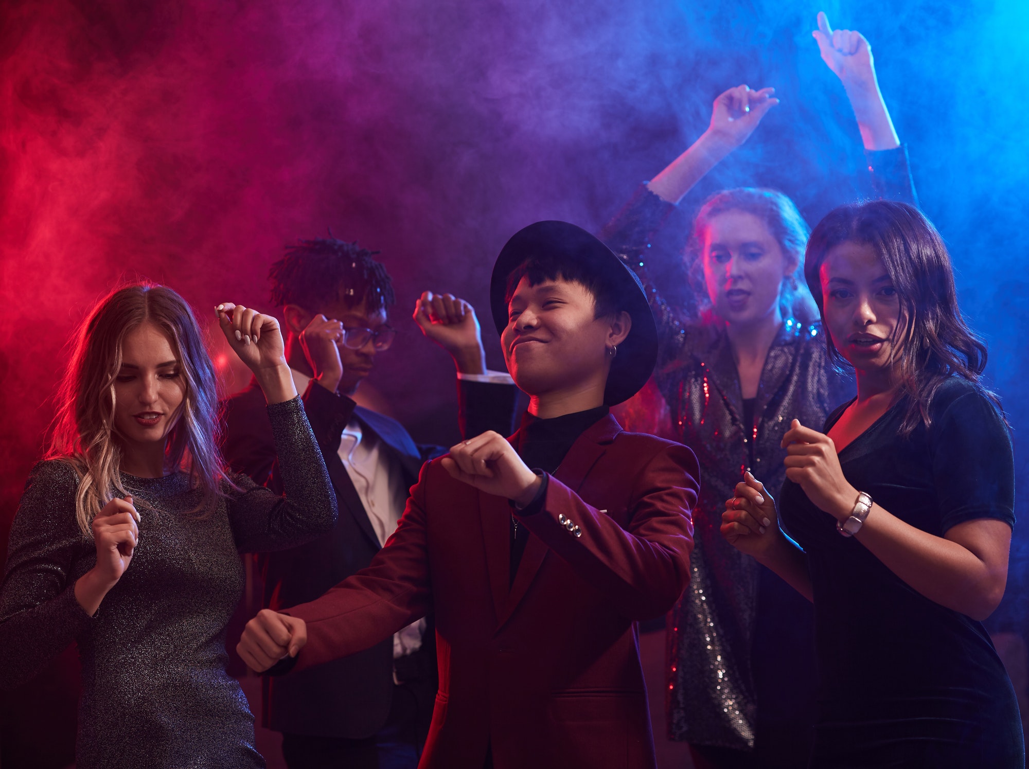 Live OPM band performance at Filipino nightclub in Dubai with crowd singing and vibrant stage lighting at Terrasse Club